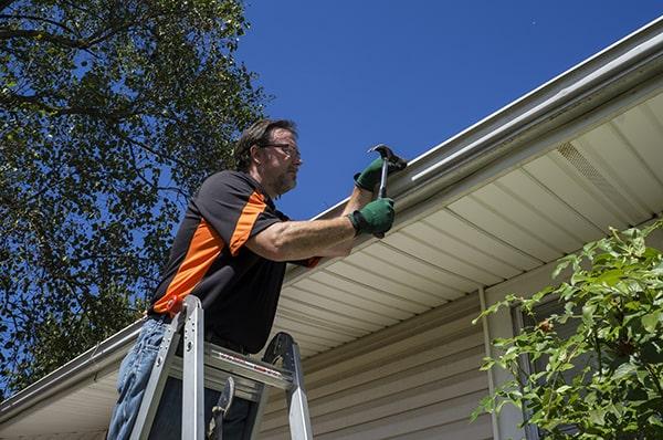 gutter repair sagging or leaking gutters, water pooling around the foundation